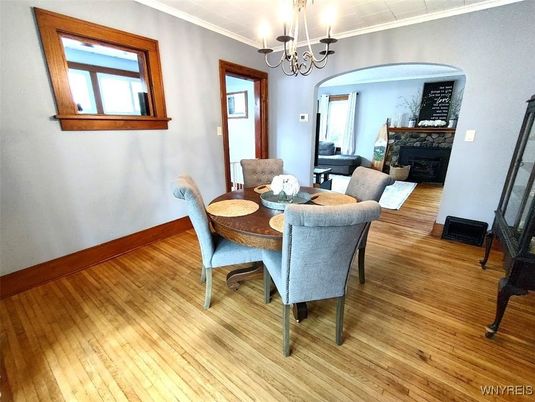 Chandelier, Dining room, Fireplace, Interior, Wood Texture Flooring