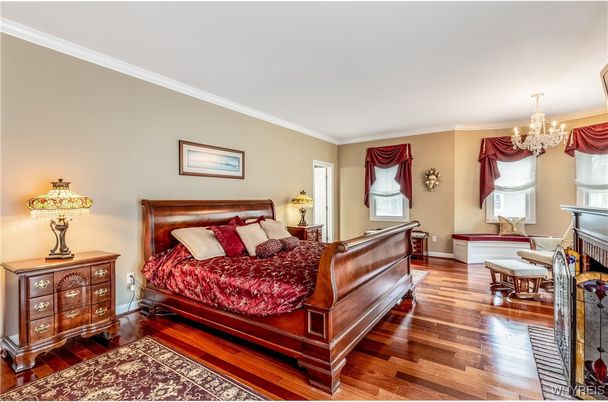 Bedroom, Chandelier, Fireplace, Interior, Wood Texture Flooring