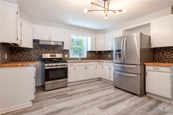 Interior, Kitchen, Pendant Lights, Stainless Steel Appliances, Wood Texture Flooring