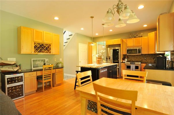 Dining room, Interior, Kitchen, Pendant Lights, Recessed Lighting, Stainless Steel Appliances, Wood Texture Flooring