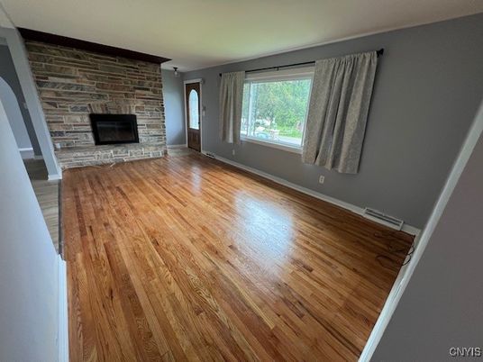 Empty room, Fireplace, Interior, Stone Walls, Wood Texture Flooring