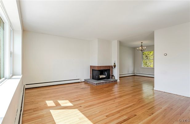 Chandelier, Empty room, Fireplace, Interior, Wood Texture Flooring