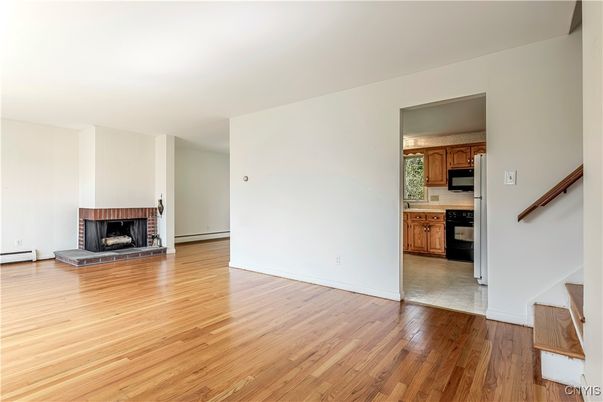Empty room, Fireplace, Interior, Kitchen, Wood Texture Flooring