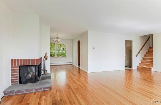 Chandelier, Empty room, Fireplace, Interior, Wood Texture Flooring