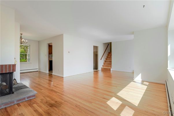 Chandelier, Empty room, Fireplace, Interior, Wood Texture Flooring
