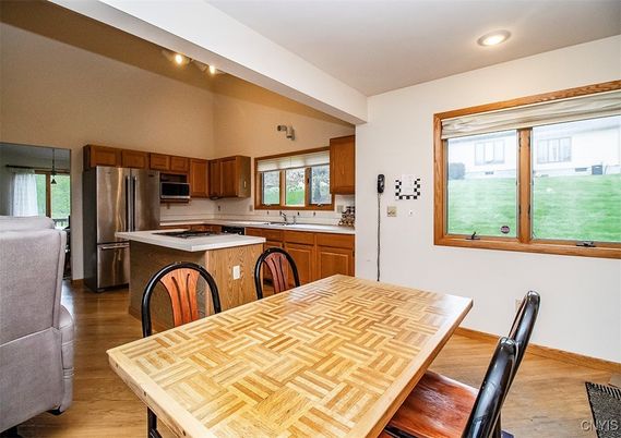 Dining room, Interior, Kitchen, Recessed Lighting, Stainless Steel Appliances, Wood Texture Flooring