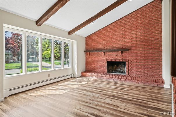 Empty room, Fireplace, Interior, Stone Walls, Wooden Beams, Wood Texture Flooring