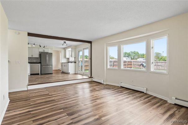 Empty room, Interior, Kitchen, Stainless Steel Appliances, Wood Texture Flooring