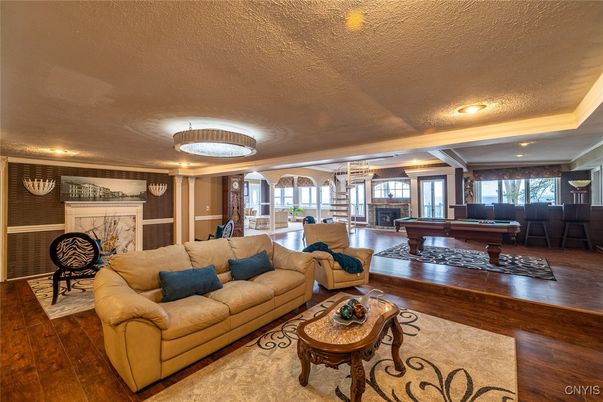 Billiard Table, Chandelier, Game Room, Interior, Living room, Recessed Lighting, Wood Texture Flooring