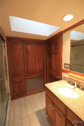Bathroom, Glass Shower, Interior, Recessed Lighting, Wood Texture Flooring