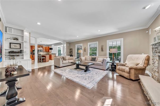 Fireplace, Interior, Kitchen, Living room, Recessed Lighting, Stainless Steel Appliances, Wood Texture Flooring