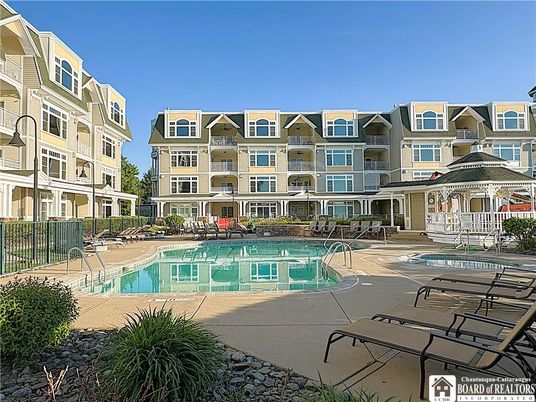 Exterior, Facade, Pool, Condo Building