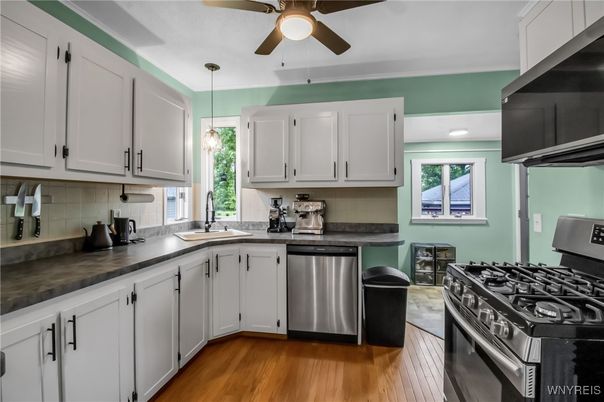 Interior, Kitchen, Pendant Lights, Recessed Lighting, Stainless Steel Appliances, Wood Texture Flooring