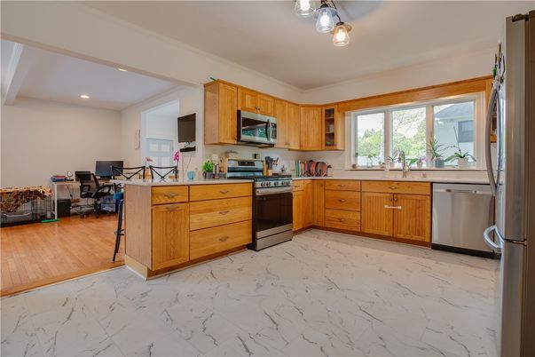Dining room, Interior, Kitchen, Marble, Recessed Lighting, Stainless Steel Appliances, Wood Texture Flooring