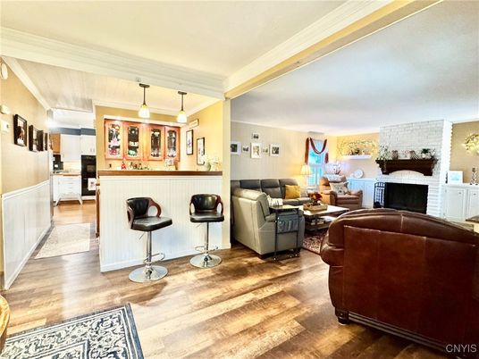 Fireplace, Interior, Kitchen, Living room, Pendant Lights, Stone Walls, Wood Texture Flooring