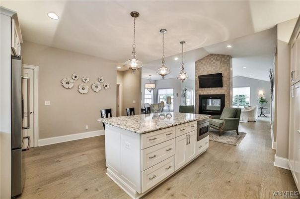Dining room, Fireplace, Interior, Kitchen, Living room, Pendant Lights, Recessed Lighting, Wood Texture Flooring