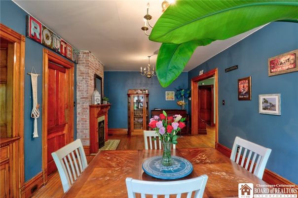 Chandelier, Dining room, Fireplace, Interior, Stone Walls, Wood Texture Flooring