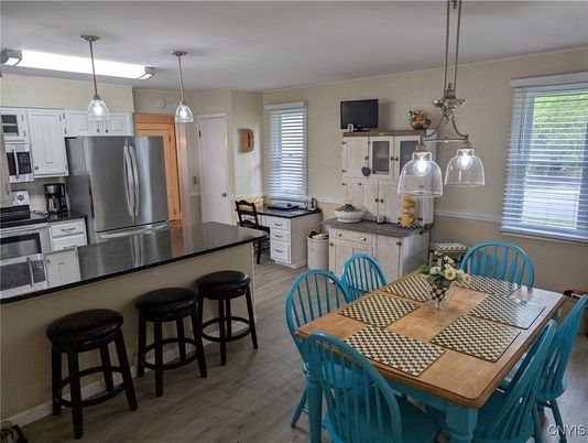 Dining room, Interior, Kitchen, Pendant Lights, Stainless Steel Appliances, Wood Texture Flooring