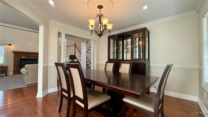 Chandelier, Dining room, Fireplace, Interior, Recessed Lighting, Wood Texture Flooring