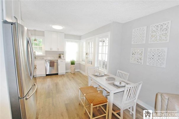 Dining room, Interior, Kitchen, Recessed Lighting, Stainless Steel Appliances, Wood Texture Flooring