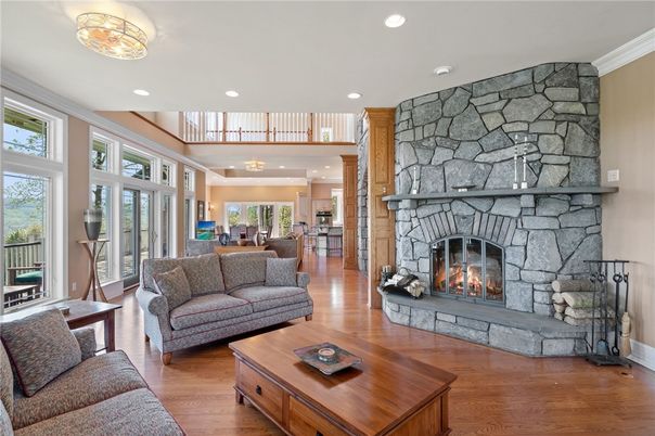 Fireplace, Interior, Living room, Recessed Lighting, Stone Walls, Wood Texture Flooring