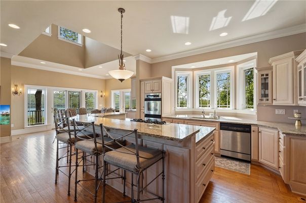 Dining room, Interior, Kitchen, Pendant Lights, Recessed Lighting, Stainless Steel Appliances, Wood Texture Flooring