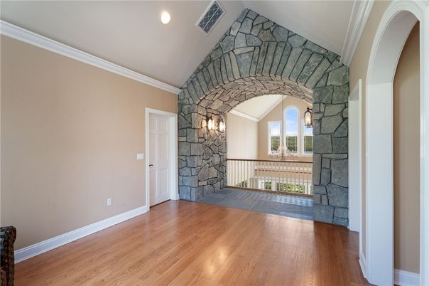 Fireplace, Interior, Recessed Lighting, Stone Walls, Wood Texture Flooring
