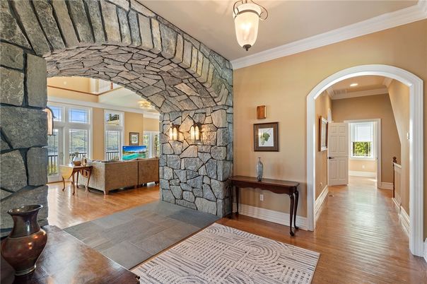 Fireplace, Interior, Living room, Recessed Lighting, Stone Walls, Wood Texture Flooring
