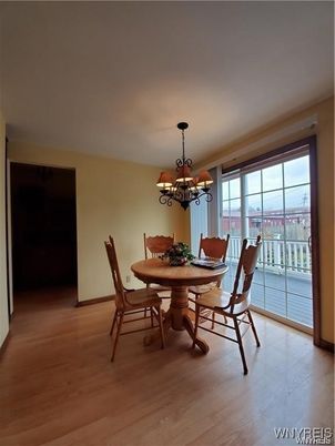 Chandelier, Dining room, Interior, Wood Texture Flooring