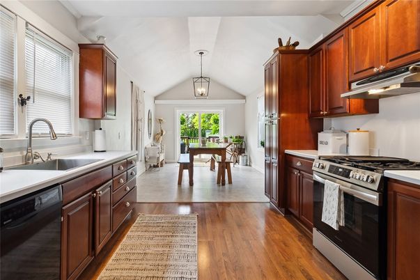 Dining room, Interior, Kitchen, Pendant Lights, Stainless Steel Appliances, Wood Texture Flooring