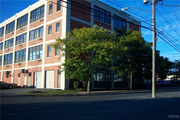 Exterior, Facade, Brick Facade, Condo Building