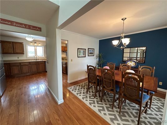 Dining room, Interior, Pendant Lights, Wood Texture Flooring