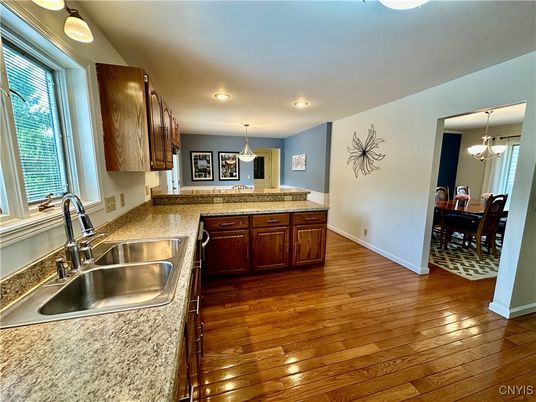 Chandelier, Dining room, Interior, Kitchen, Pendant Lights, Recessed Lighting, Wood Texture Flooring