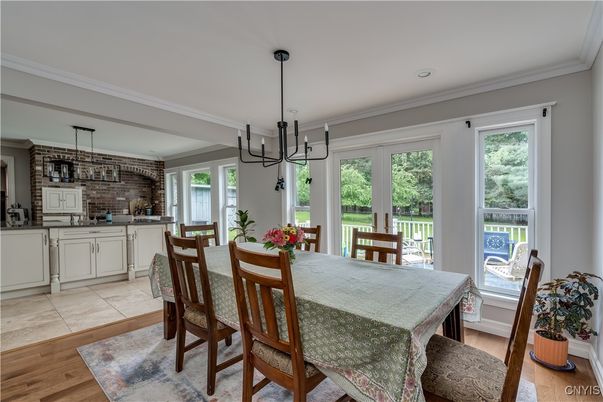 Chandelier, Dining room, Interior, Kitchen, Pendant Lights, Recessed Lighting, Stone Walls, Wood Texture Flooring