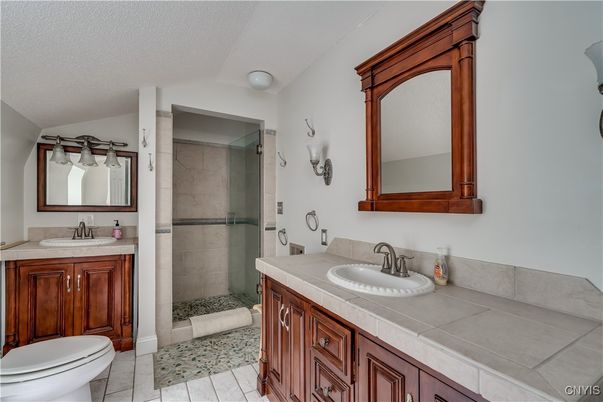 Bathroom, Dual Sink Vanities, Glass Shower, Interior, Tile Countertops