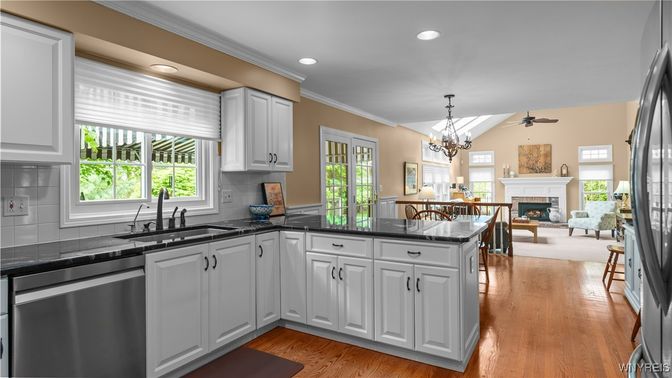 Chandelier, Dining room, Fireplace, Interior, Kitchen, Recessed Lighting, Wood Texture Flooring