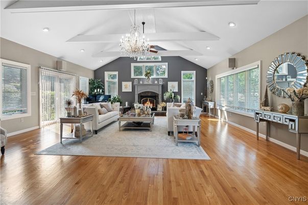 Chandelier, Fireplace, Interior, Living room, Recessed Lighting, Wood Texture Flooring