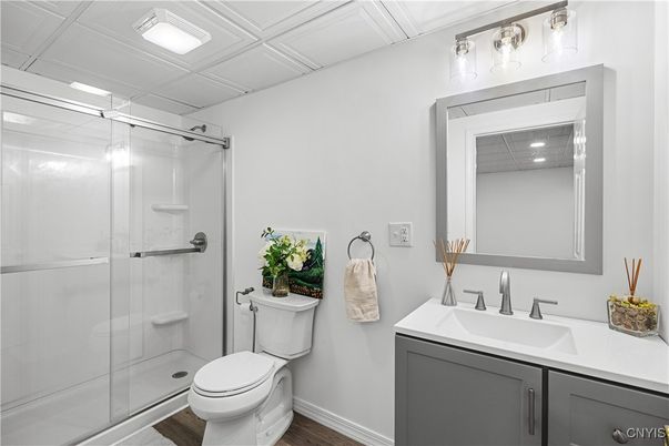 Bathroom, Glass Shower, Interior, Recessed Lighting, Wood Texture Flooring