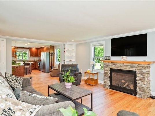 Fireplace, Interior, Kitchen, Living room, Pendant Lights, Recessed Lighting, Stainless Steel Appliances, Wood Texture Flooring