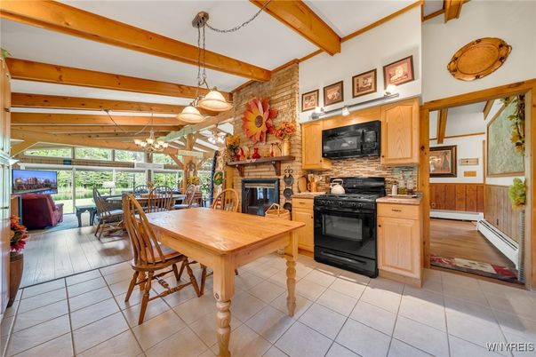 Dining room, Fireplace, Interior, Pendant Lights, Wooden Beams, Wood Texture Flooring