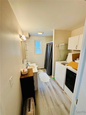 Bathroom, Interior, Washer, Wood Texture Flooring