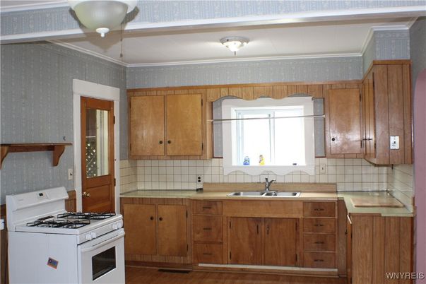 Interior, Kitchen, Tile Countertops, Wood Texture Flooring