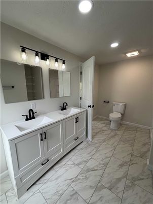 Bathroom, Dual Sink Vanities, Interior, Marble, Recessed Lighting