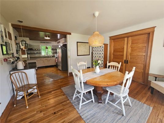 Dining room, Interior, Kitchen, Pendant Lights, Stainless Steel Appliances, Wood Texture Flooring