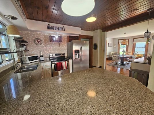 Dining room, Interior, Kitchen, Pendant Lights, Stainless Steel Appliances, Wooden Ceilings, Wood Texture Flooring