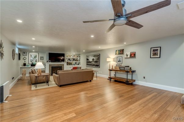 Fireplace, Interior, Living room, Recessed Lighting, Wood Texture Flooring