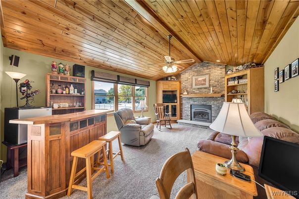 Fireplace, Interior, Living room, Recessed Lighting, Stone Walls, Wooden Ceilings