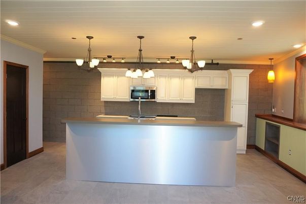 Interior, Kitchen, Pendant Lights, Recessed Lighting, Stainless Steel Appliances, Stone Walls