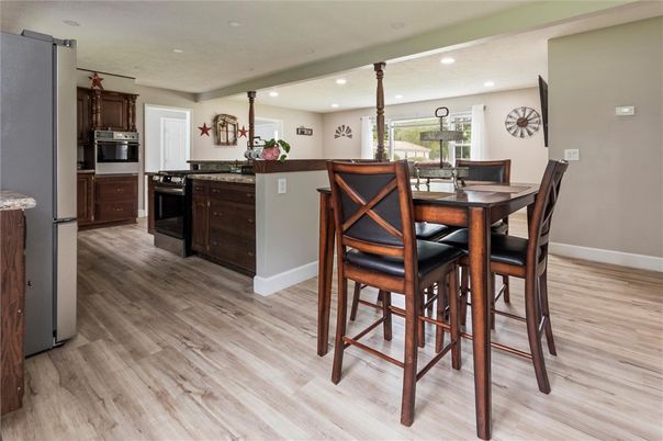 Dining room, Interior, Kitchen, Recessed Lighting, Stainless Steel Appliances, Wood Texture Flooring