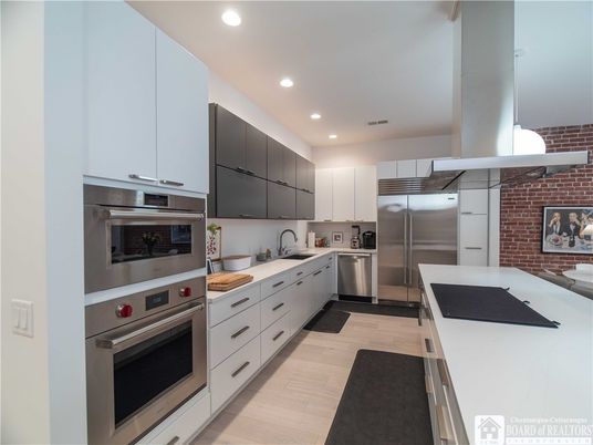 Interior, Kitchen, Recessed Lighting, Stainless Steel Appliances, Stone Walls, Wood Texture Flooring